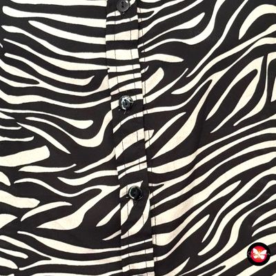 **HOY** Camisa de manga larga estampado cebra Talla 40