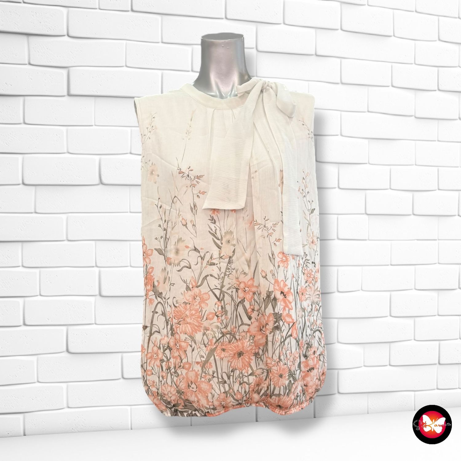 **HOY** Blusa sin mangas con lazada al cuello ZERO Talla 40