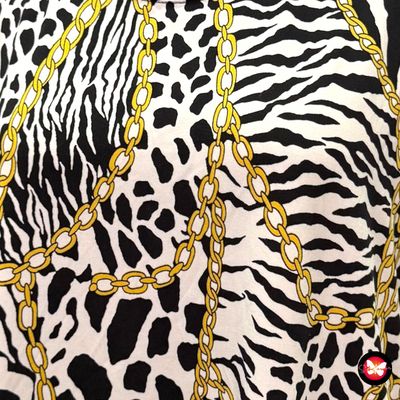 Blusa de manga corta animal print con cadenas Talla L