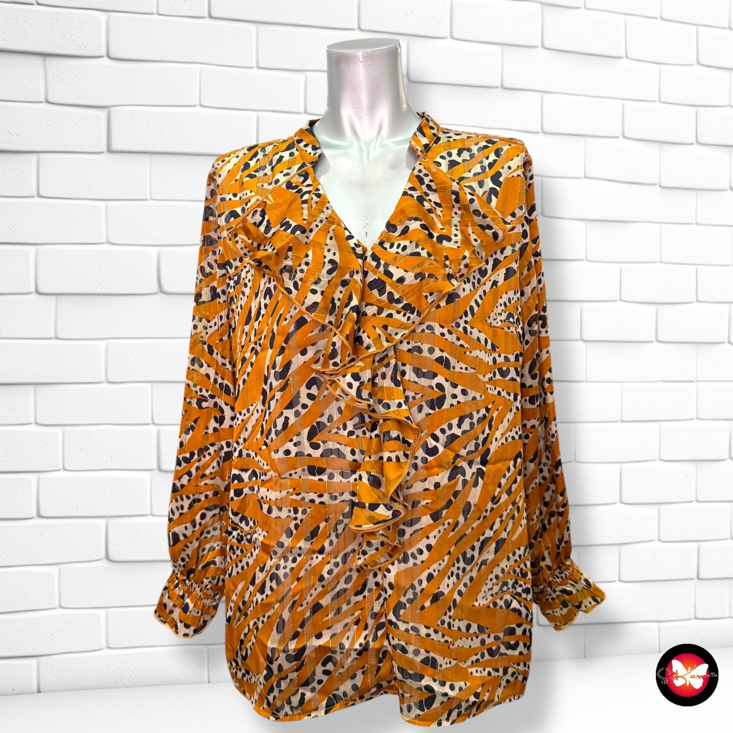 Blusa de manga larga con brillo Talla L/XL