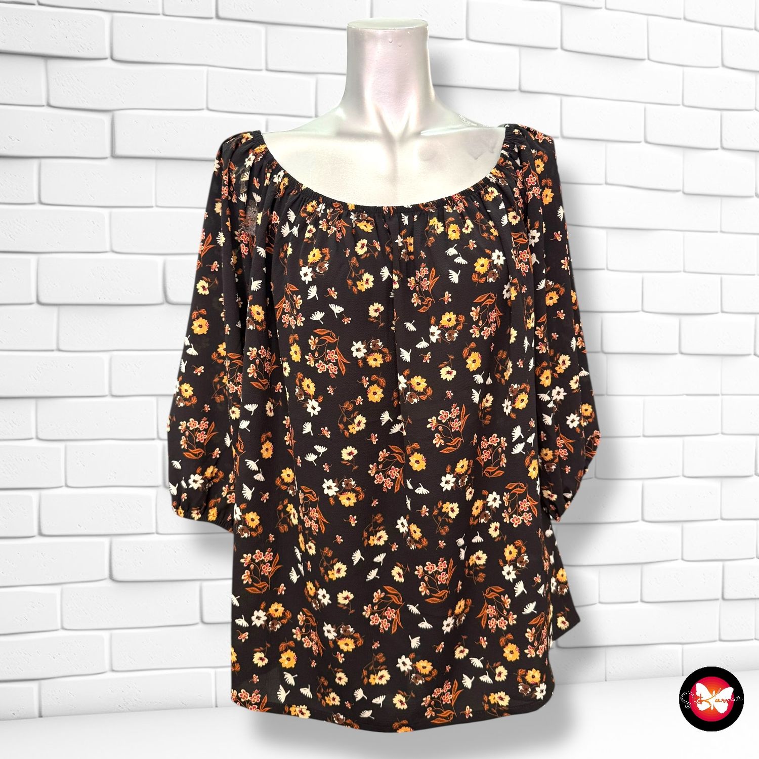 Blusa escote barco de florecitas Talla Única