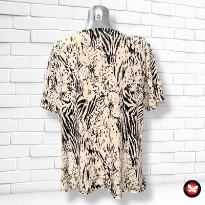 **HOY** Blusa animal print con nudo y brillo Talla XL