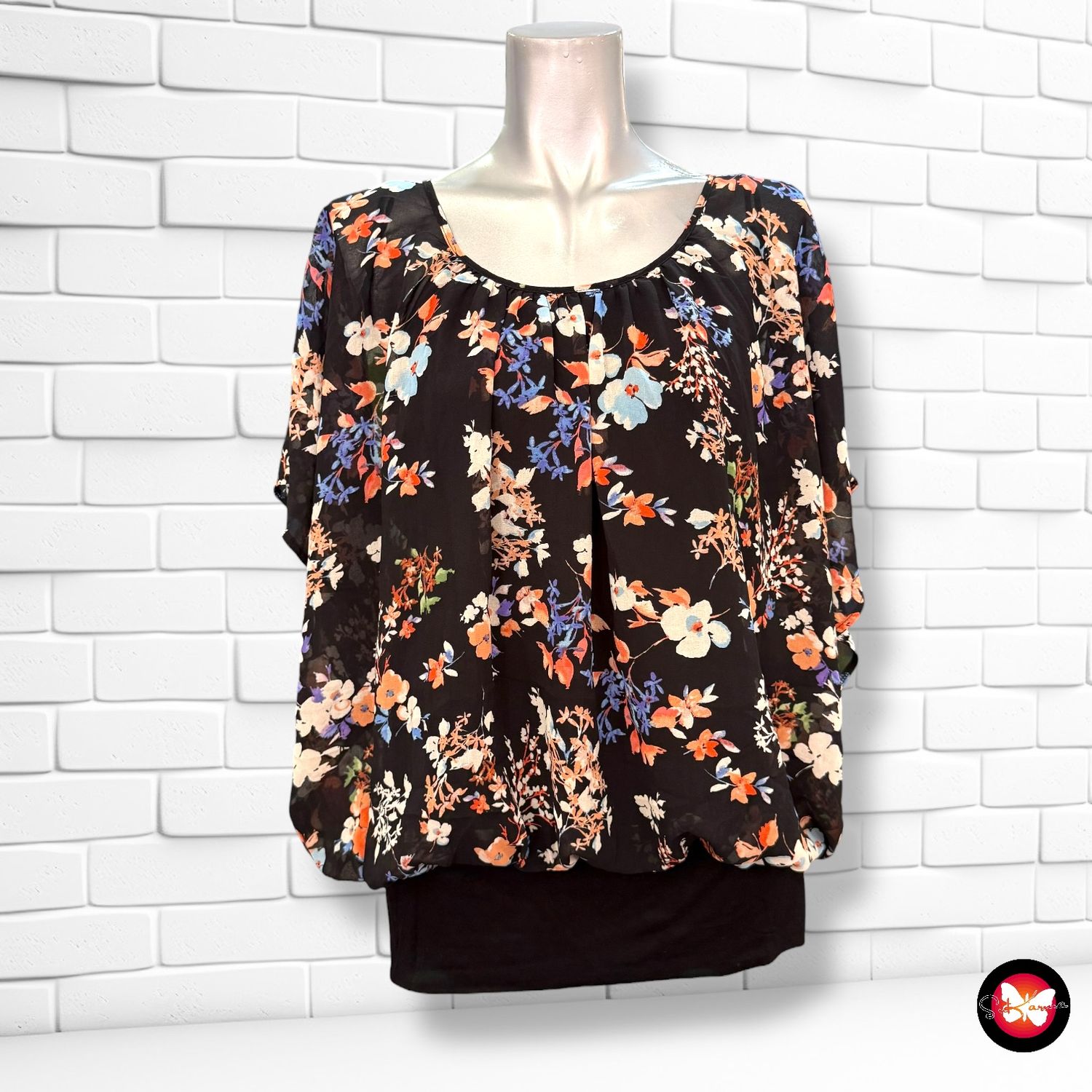 **HOY** Blusa corte mariposa de flores DUNNES Talla 42
