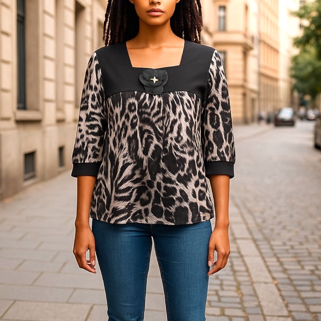 Blusa de media manga estampado animal print Talla L