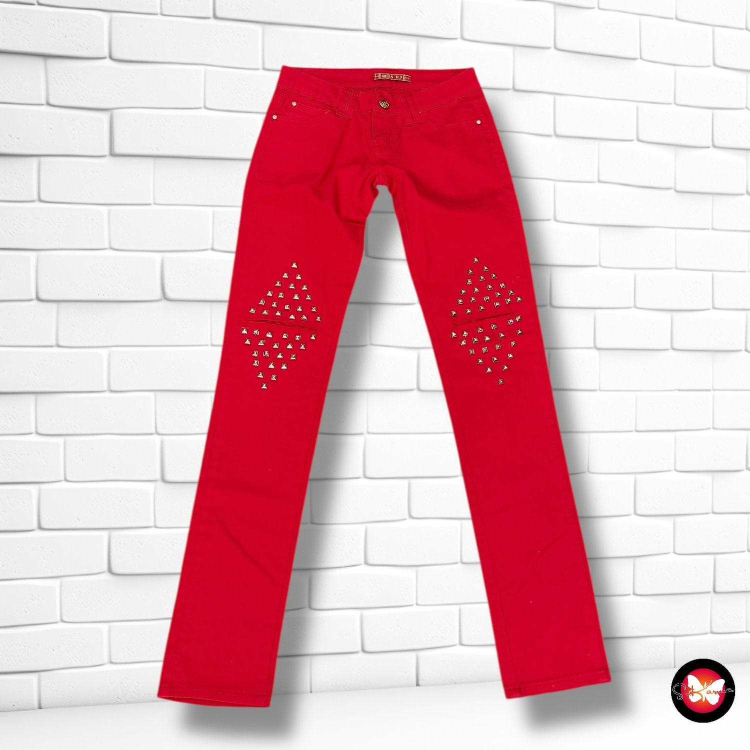 Pantalón vaquero con tachitas Talla M