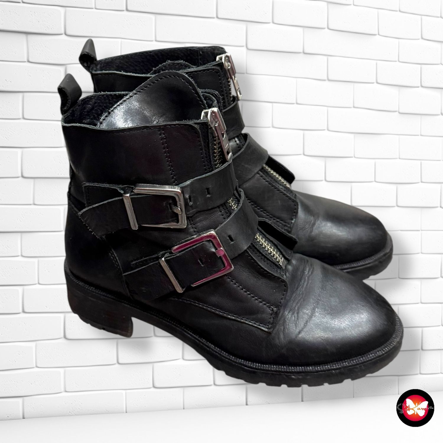 Botines de piel con correas T39