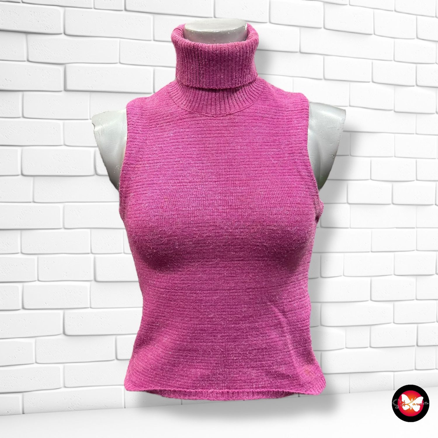 **HOY** Jersey sin mangas de lurex con cuello altoTRAFALUE Talla M