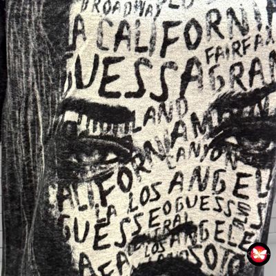 **HOY** Jersey de manga larga con estampado GUESS Talla M