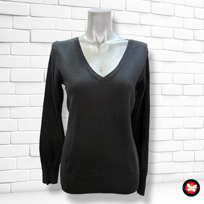 Jersey de manga básico con botoncitos en los puños Talla S