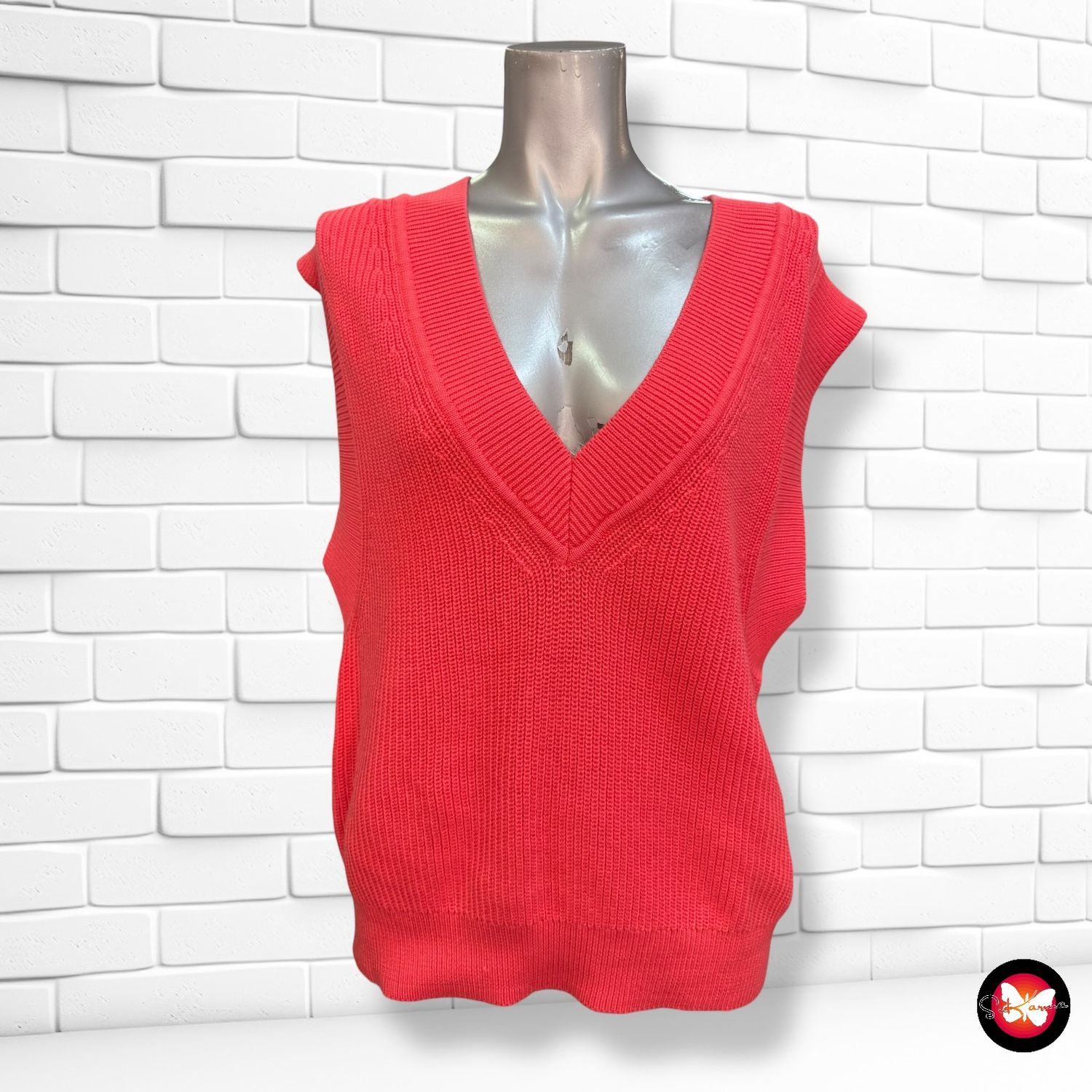 **HOY** Chaleco de punto con aberturas Talla L