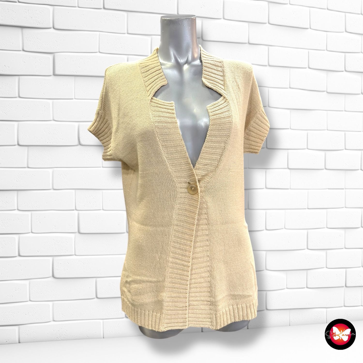 Chaqueta de punto de manga corta KILT Talla M