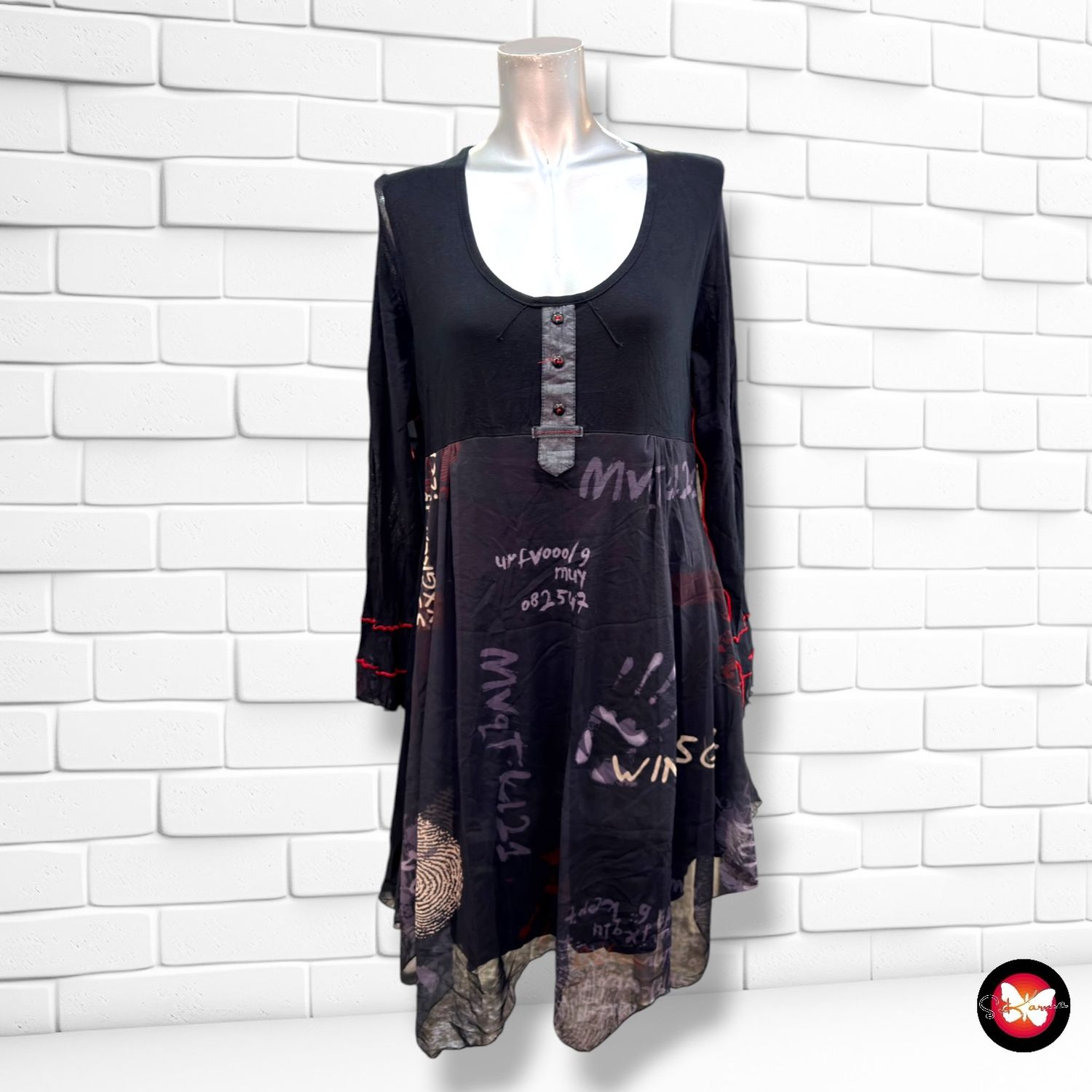 Vestido de manga larga con transparencias  color Negro Talla M/L