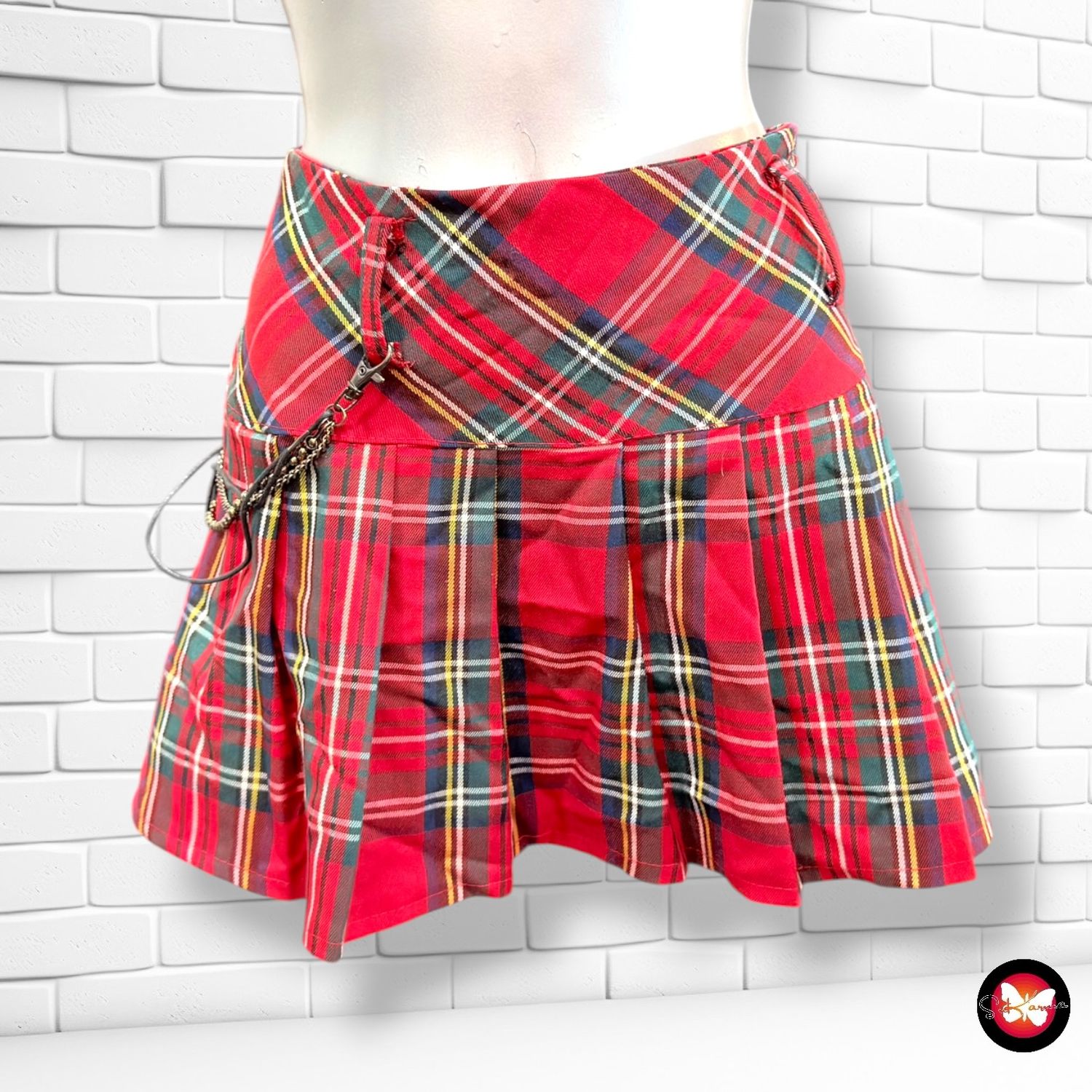Falda preppy de cuadros  color Rojo y varios Talla L