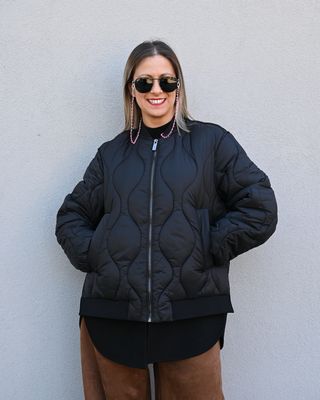 Piumino over Vicolo nero