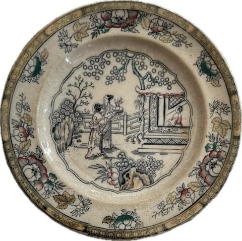 Set of 10 dinner plates and a footed bowl