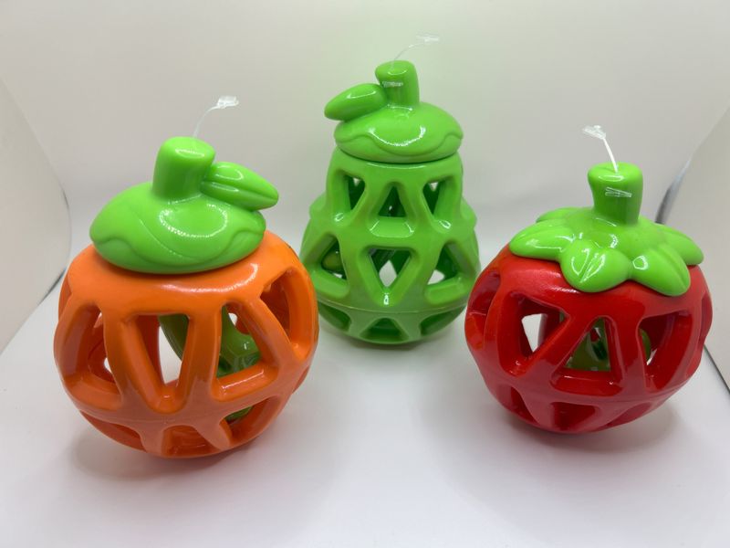 SENYe Fruity Bites Strawberry, Pear, and Orange Treat Dispensing Dog Toys.