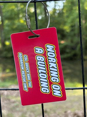 Working on a Building Luggage Tag