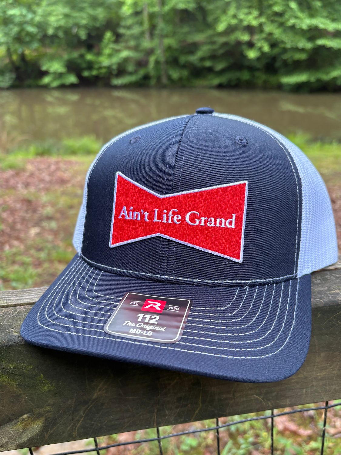 Ain't Life Grand 1 Navy/White Trucker Hat