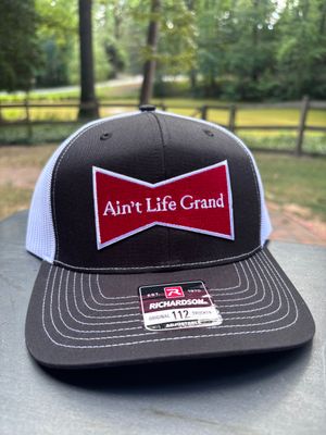 Ain't Life Grand Black/White Trucker Hat