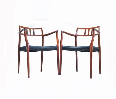 A Scarce Pair Of Niels Møller Model 64 Rosewood Carver Chairs For J L Moller, Denmark.