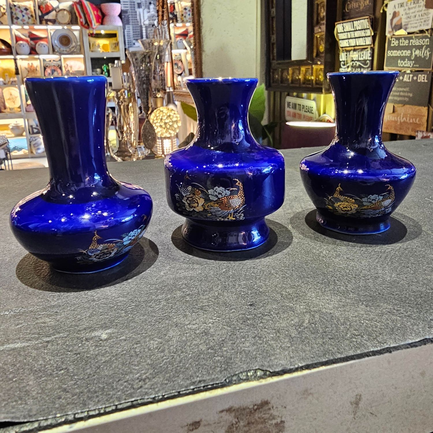 VINTAGE JAPANESE COBALT BLUE VASE WITH A HAND PAINTED FLORAL AND PEACOCK MOTIF