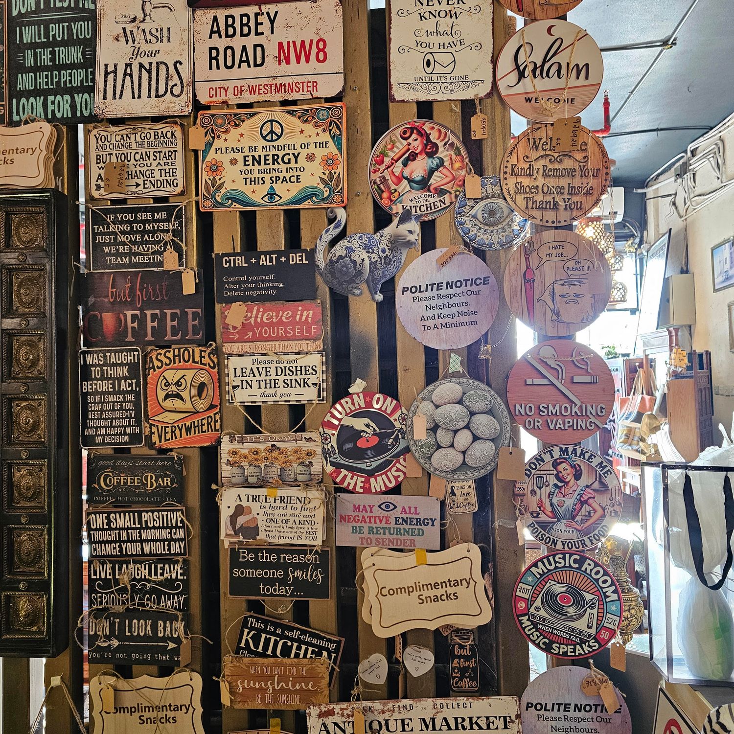 ASSORTED SIGNS HANGING