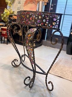 ORNATE METAL WORK WITH MULTICOLORED JEWELS LIKE CRYSTAL