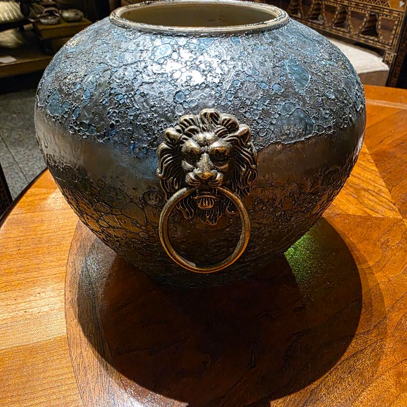 SMALL VASE METALLIC EFFECT LIGHT BLUE AND BRONZED TONED LION HEAD WITH RING HANDLE