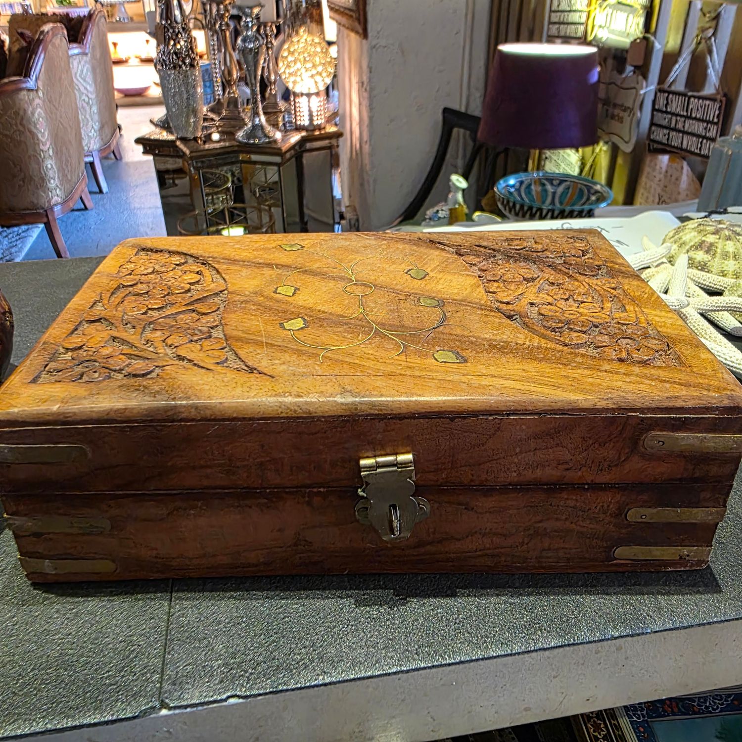 SMALL HANDCRAFTED WOODEN JEWELLERY BOX WITH INTRICATE CARVINGS AND BRASS FITTING