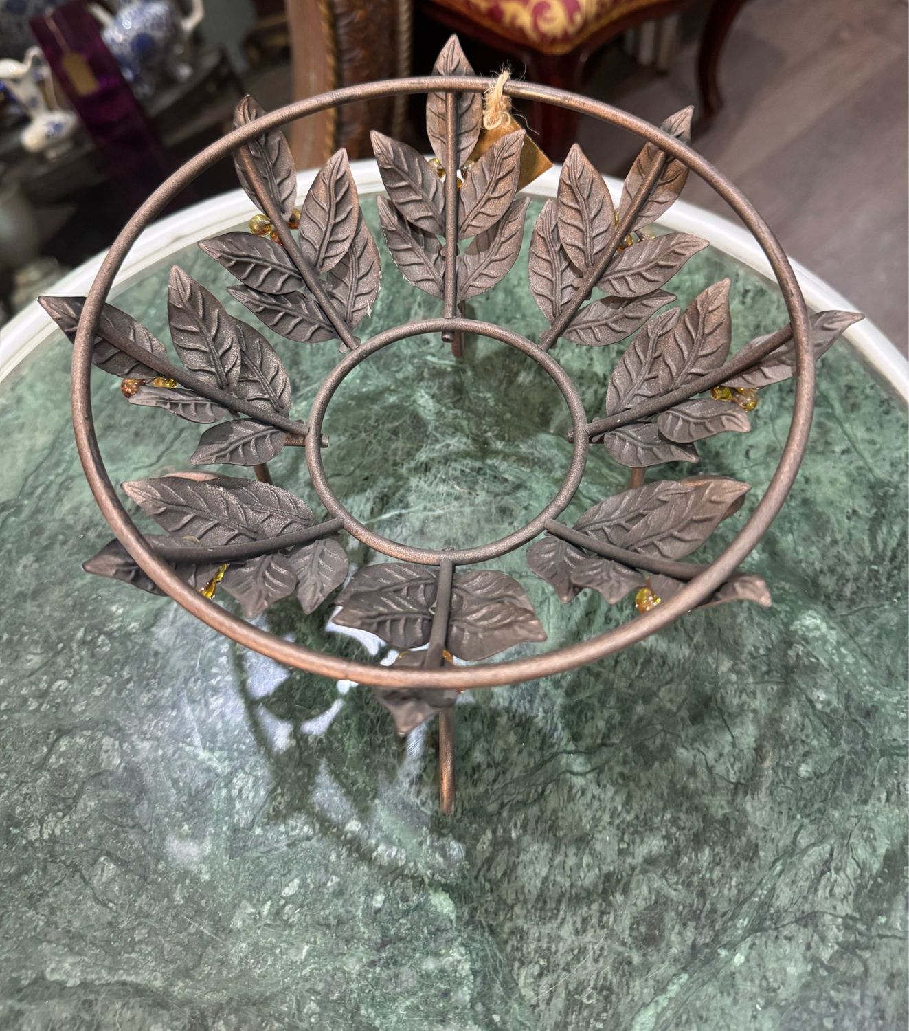 METAL PEDESTAL BOWL CENTERPIECE WITH ORNATE LEAF BEAD ACCENT