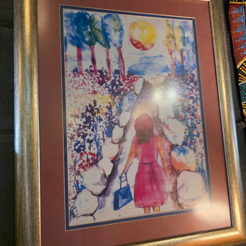 PAINTING FEATURES A VIBRANT IMPRESSIONISTIC STYLE WITH A FIGURE OF A WOMAN IN A PINK DRESS WALKING ALONG A PATH OF STONE