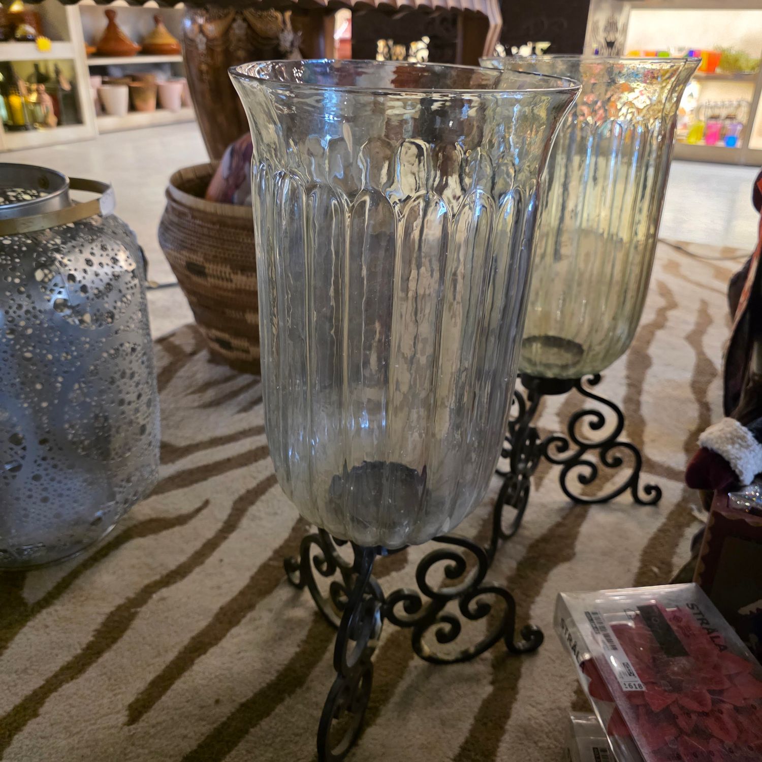 FLUTED GLASS HURRICANE CANDLE HOLDER WITH BLACK WROUGHT IRON STAND