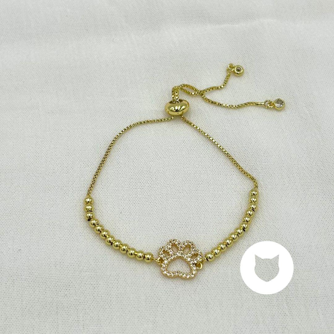 PULSERA DE BAÑO DE ORO Y CRISTALES HUELLA PERRO PU1934G34