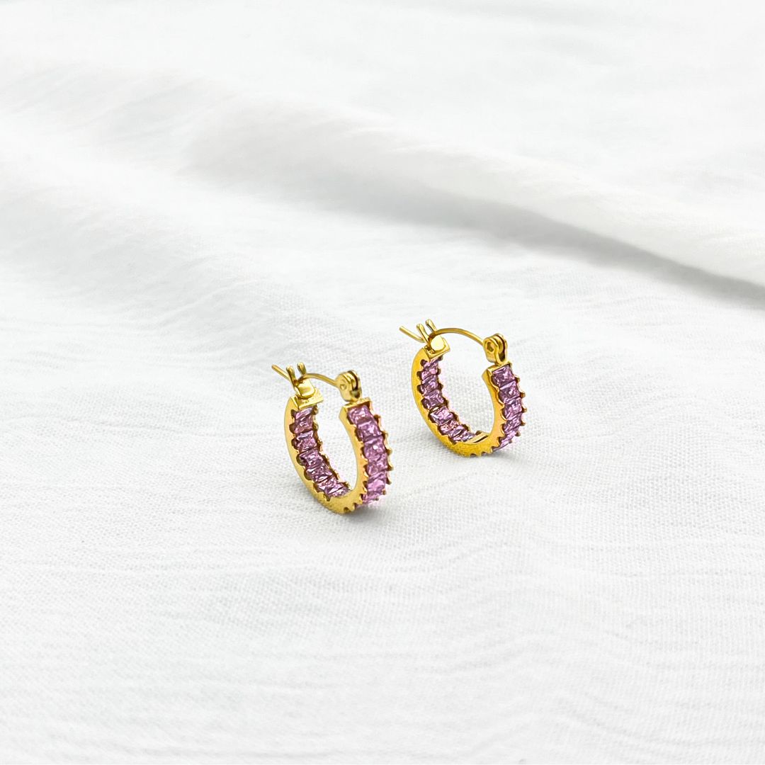 ARGOLLAS ACERO CHISPAS ROSADAS (2 TONOS) ARGOLLAS ACERO CHISPAS ROSADAS (2 TONOS)