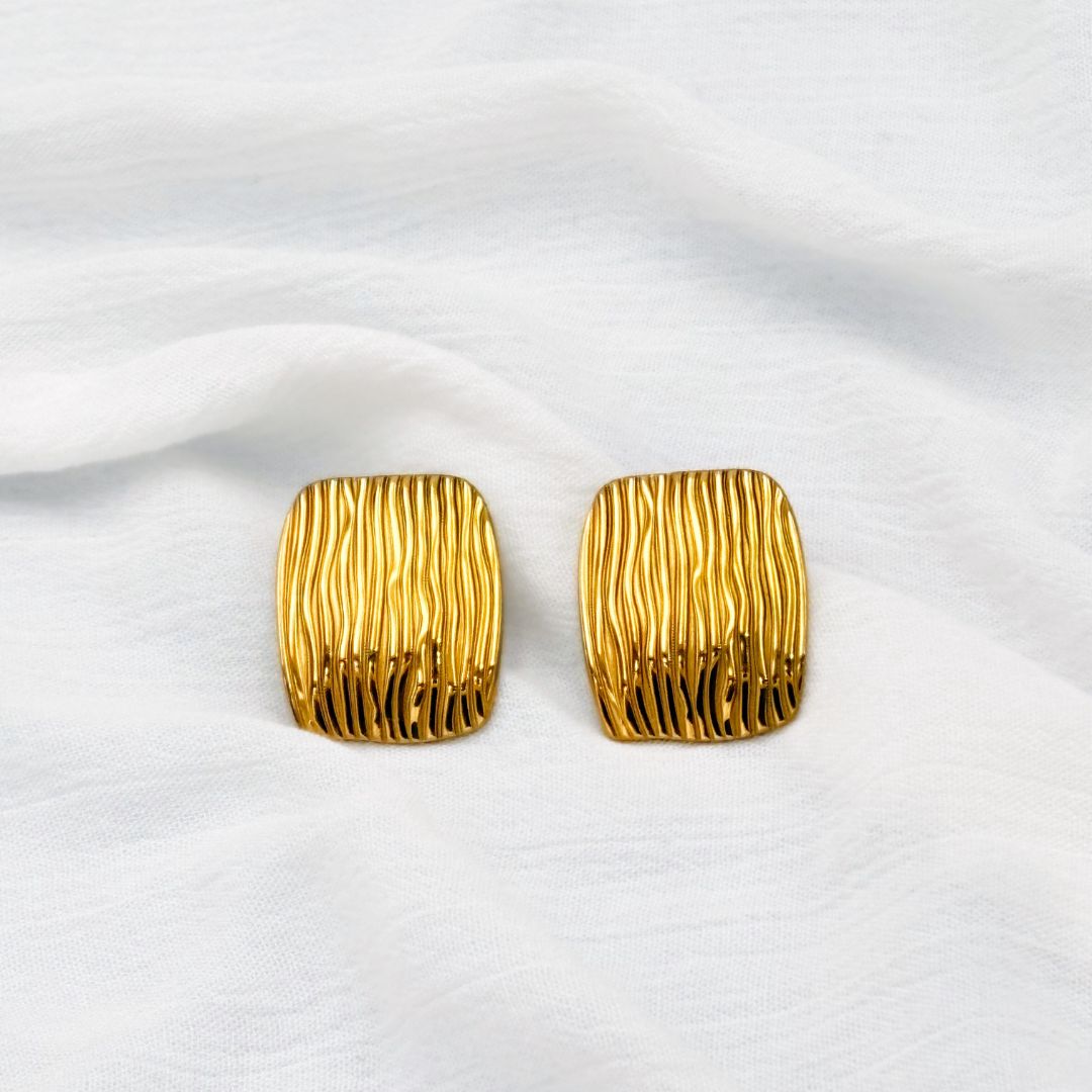 ARETES ACERO CUADRADOS CON RAYAS AR3106G71 ARETES ACERO CUADRADOS CON RAYAS AR3106G71