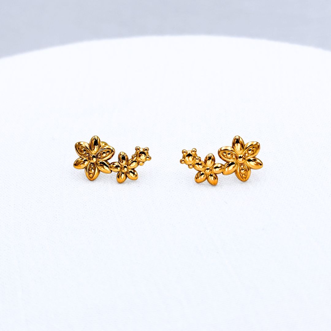 ARETES ACERO TRES FLORES AB0534G52 ARETES ACERO TRES FLORES AB0534G52
