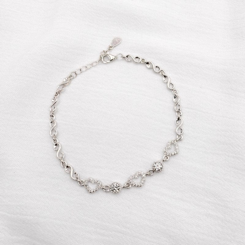 PULSERAS PLATA CON CORAZONES Y CRISTALES REDONDOS CADENA DE INFINITOS PU2033L22