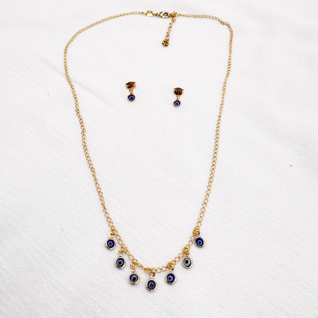 SET DE COLLAR Y ARETES CON DIJES DE OJO TURCO EN BAÑO DE ORO DE 18K SE1073G32