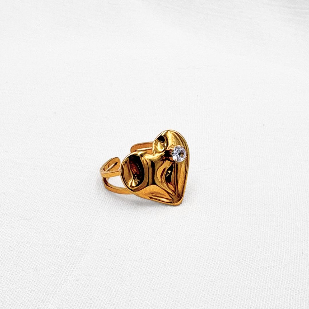 ANILLO AJUSTABLE DE CORAZÓN ORGÁNICO CON CRISTAL EN ACERO CON BAÑO DE ORO DE 18K  AN3892G112