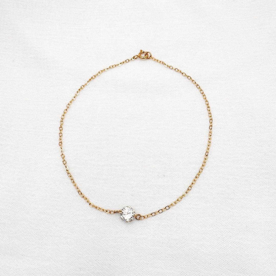 TOBILLERA DE CADENA FINA CON SOLITARIO DE CRISTAL EN ACERO TO0131G55