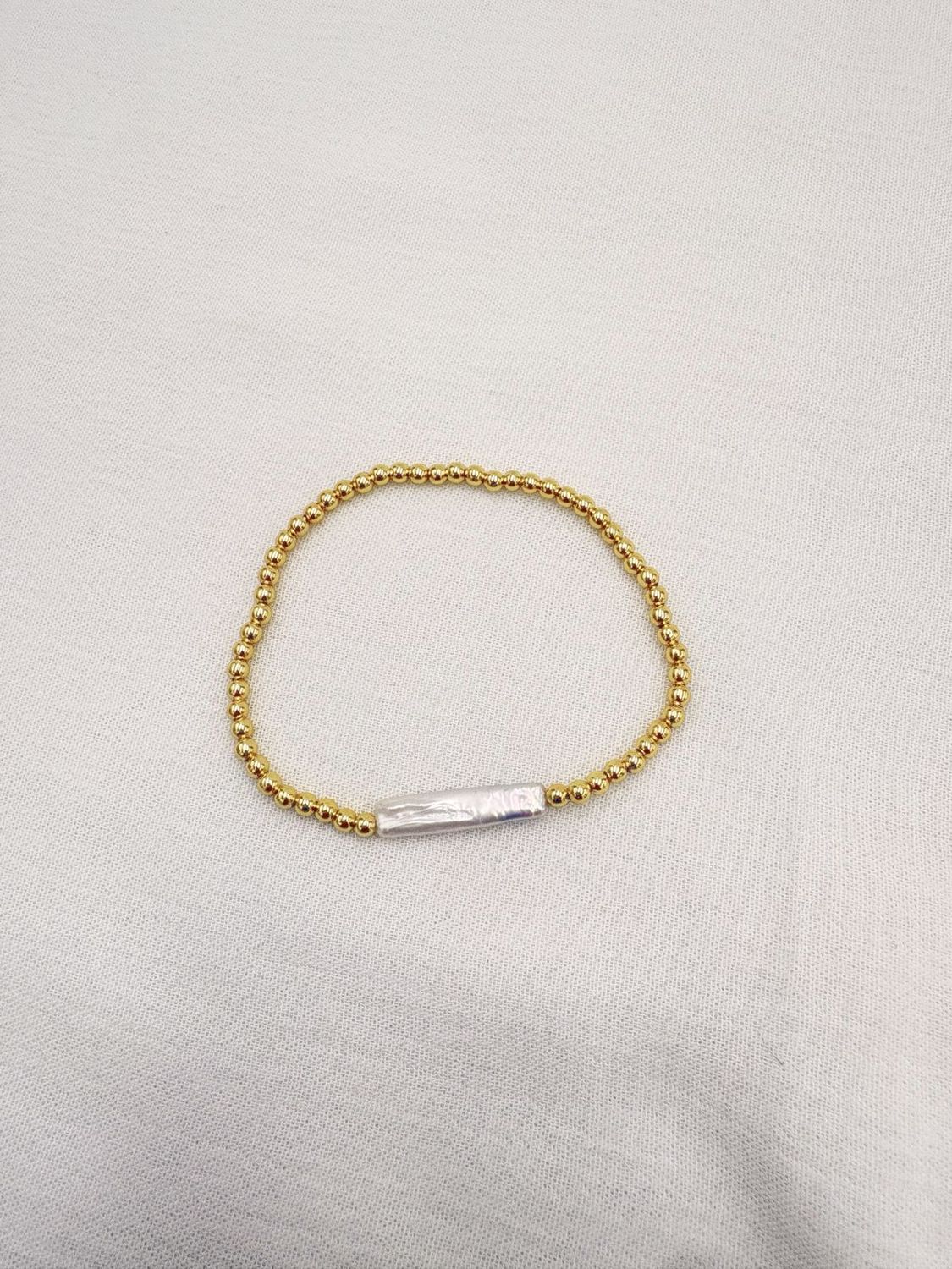 Pulsera elástica de bolita con perla barroca PU2070G55 Pulsera elástica de bolita con perla barroca PU2070G55