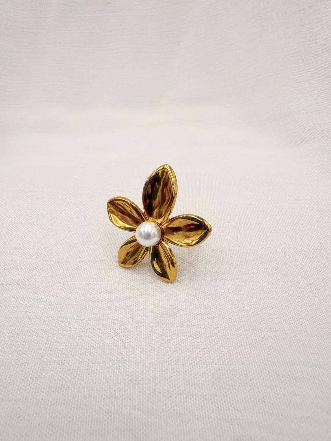 ANILLO DE FLOR CON PERLA CENTRAL AJUSTABLE EN ACERO AN3917G55 ANILLO DE FLOR CON PERLA CENTRAL AJUSTABLE EN ACERO AN3917G55