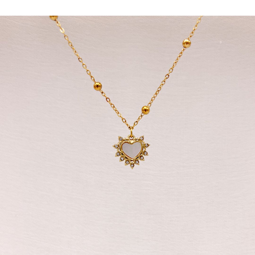 COLLAR DE CORAZÓN COLLAR DE CORAZÓN "SOL RADIANTE" CON MADREPERLA Y CRISTALES EN ACERO CO1901G45