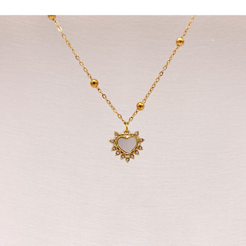 COLLAR DE CORAZÓN "SOL RADIANTE" CON MADREPERLA Y CRISTALES EN ACERO  CO1901G45