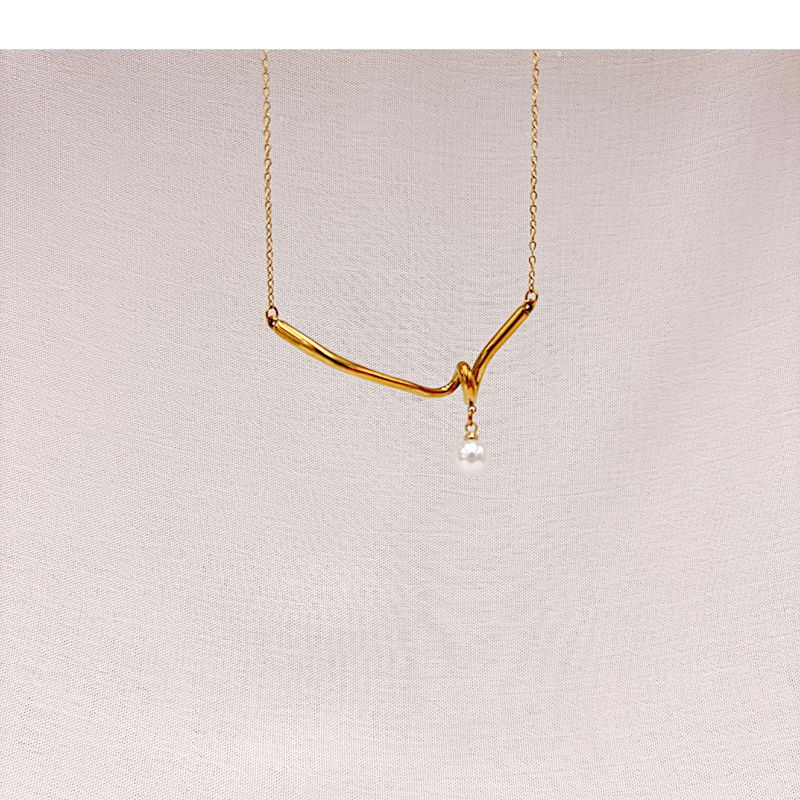 COLLAR DE BARRA ORGÁNICA "NUDO" CON PERLA EN ACERO CO1904G69