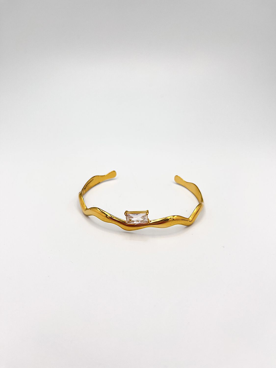 BRAZALETE DE ACERO EN FORMA DE ONDAS CON CIRCONIA RECTANGULAR PU2084G49