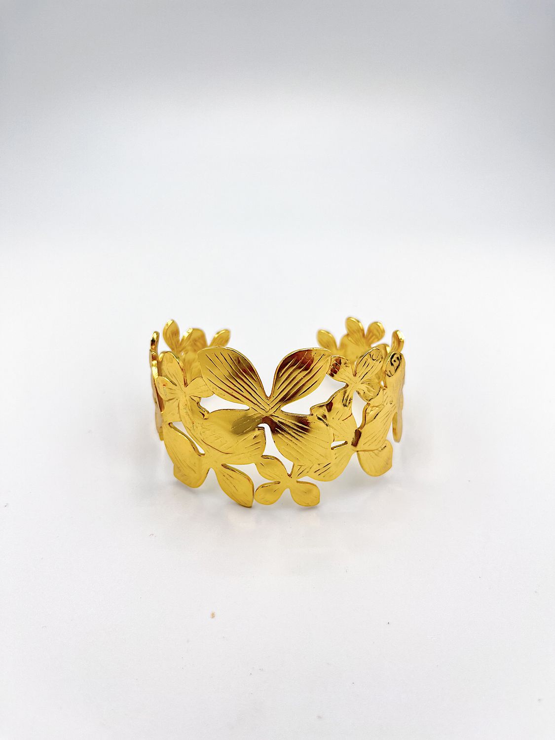 BRAZALETE DE ACERO "JARDÍN ETERNO" CON DISEÑO DE FLORES CALADAS PU2080G115