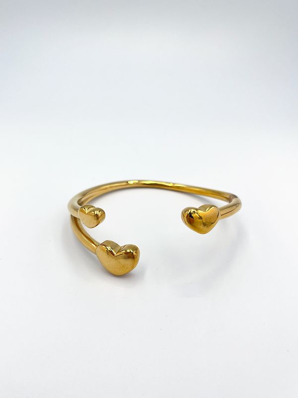 BRAZALETE DE ACERO DE 3 CORAZONES