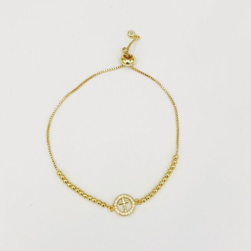 PULSERA DE CRUZ EN CIRCULO DE CIRCONES BAÑO DE ORO PU2102G70 PULSERA DE CRUZ EN CIRCULO DE CIRCONES BAÑO DE ORO PU2102G70
