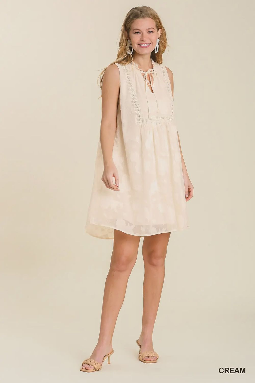 CREAM SLEEVELESS DRESS